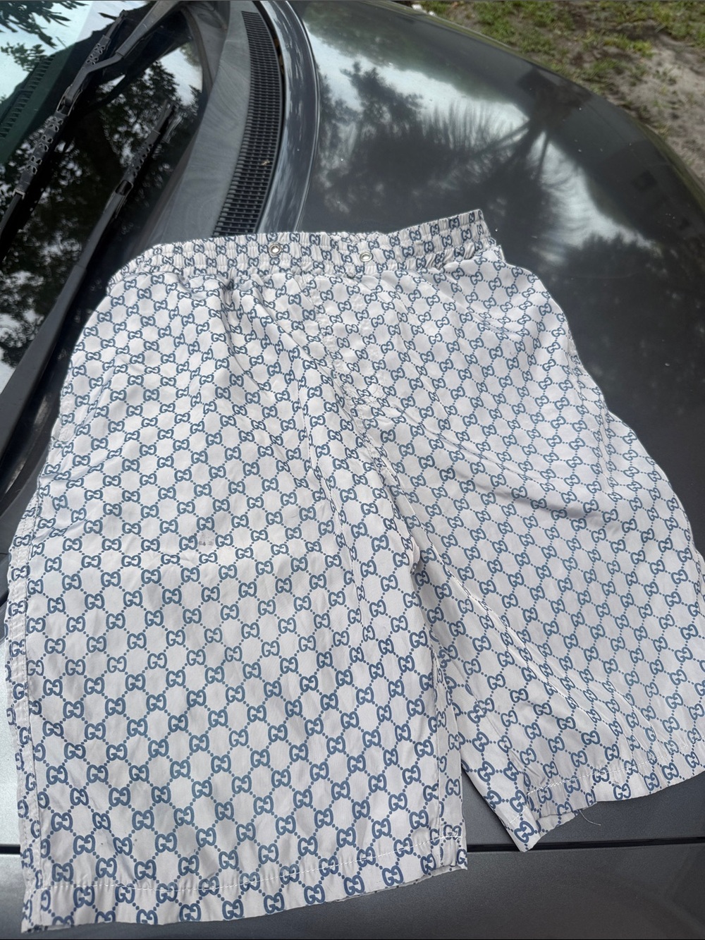 Gucci Beige Shorts with Blue Monogram Print
